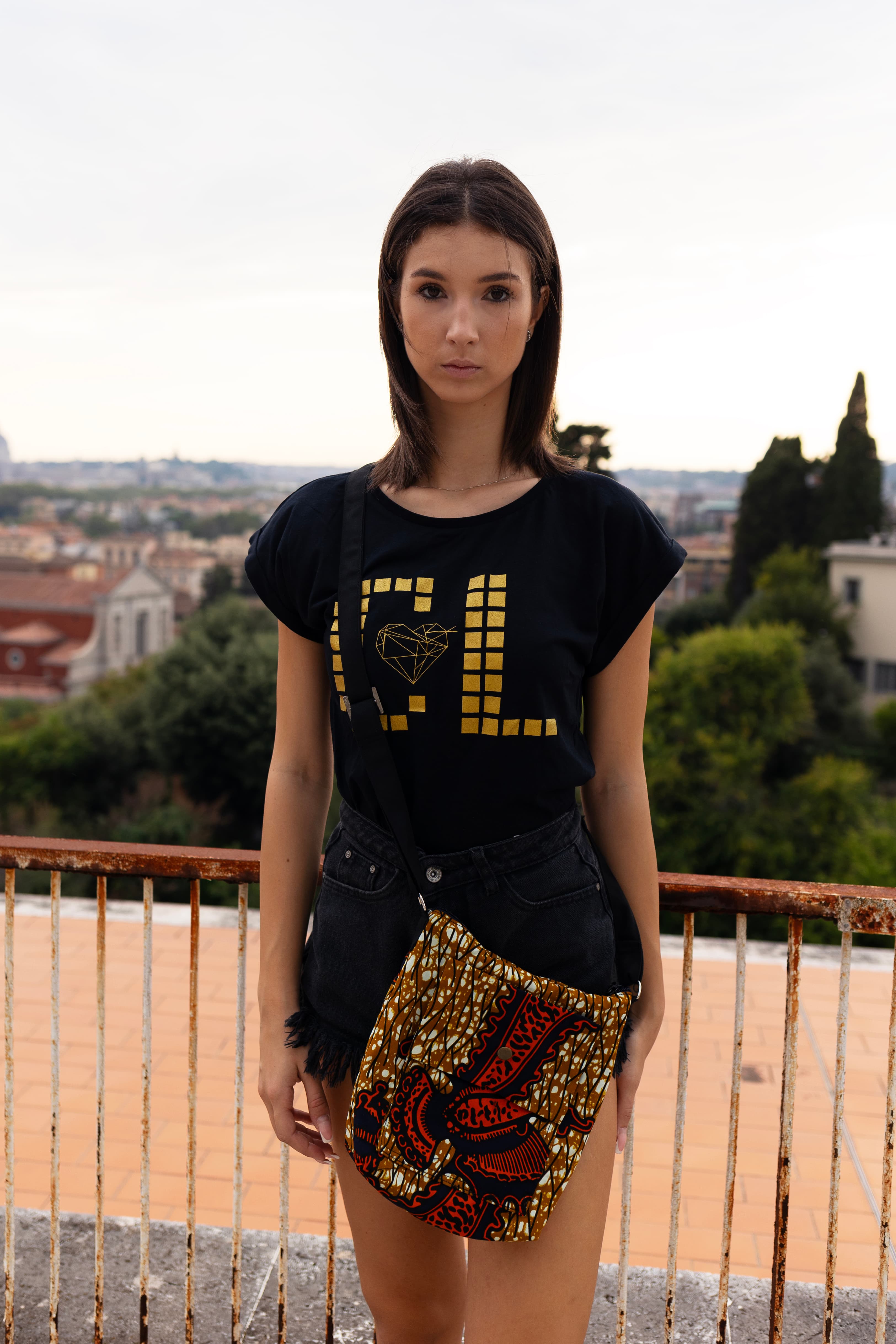 Small crossbody bag with Continental Love print