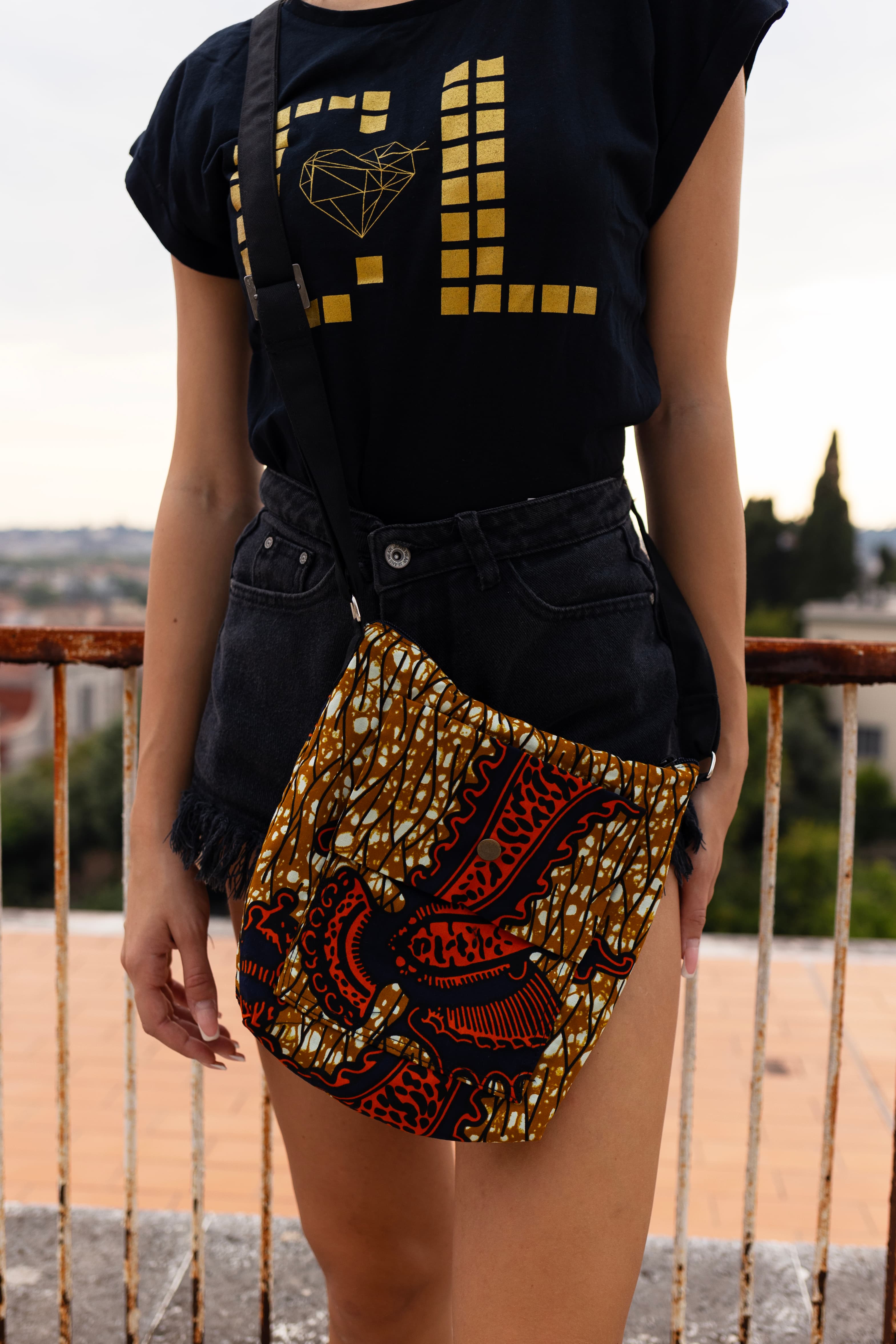 Small crossbody bag with Continental Love print