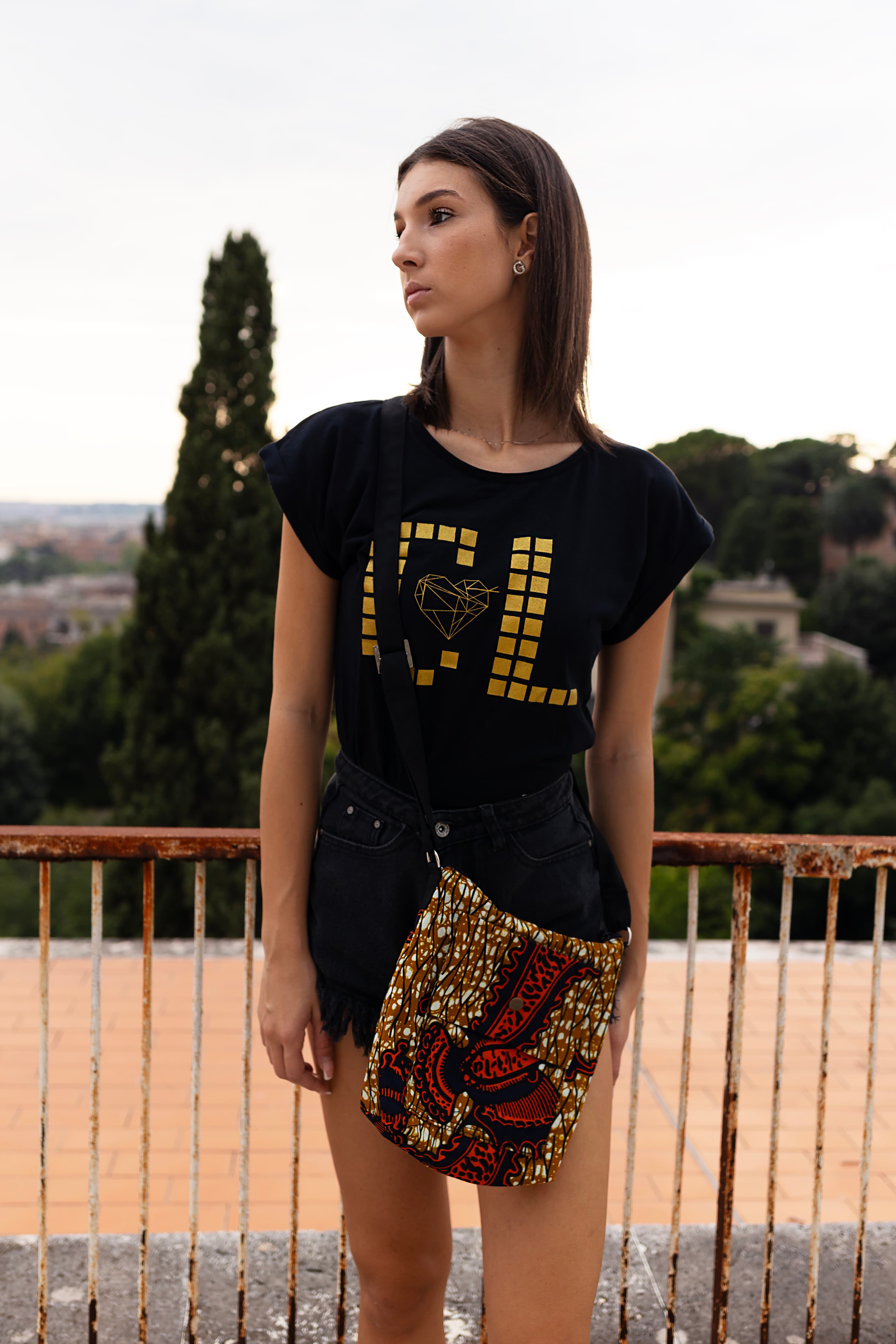 Small crossbody bag with Continental Love print